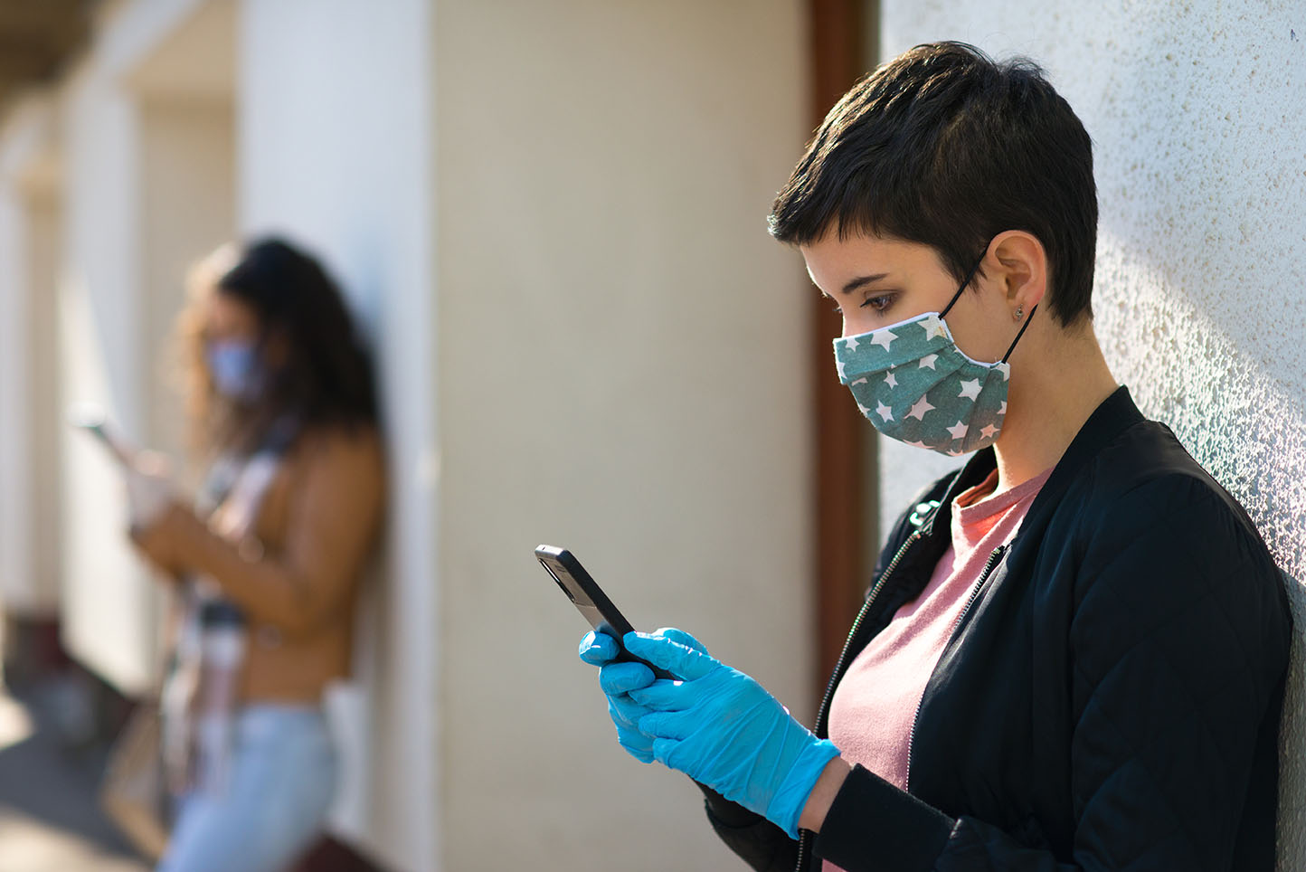 Woman In Town Wearing Protective Face Masks.