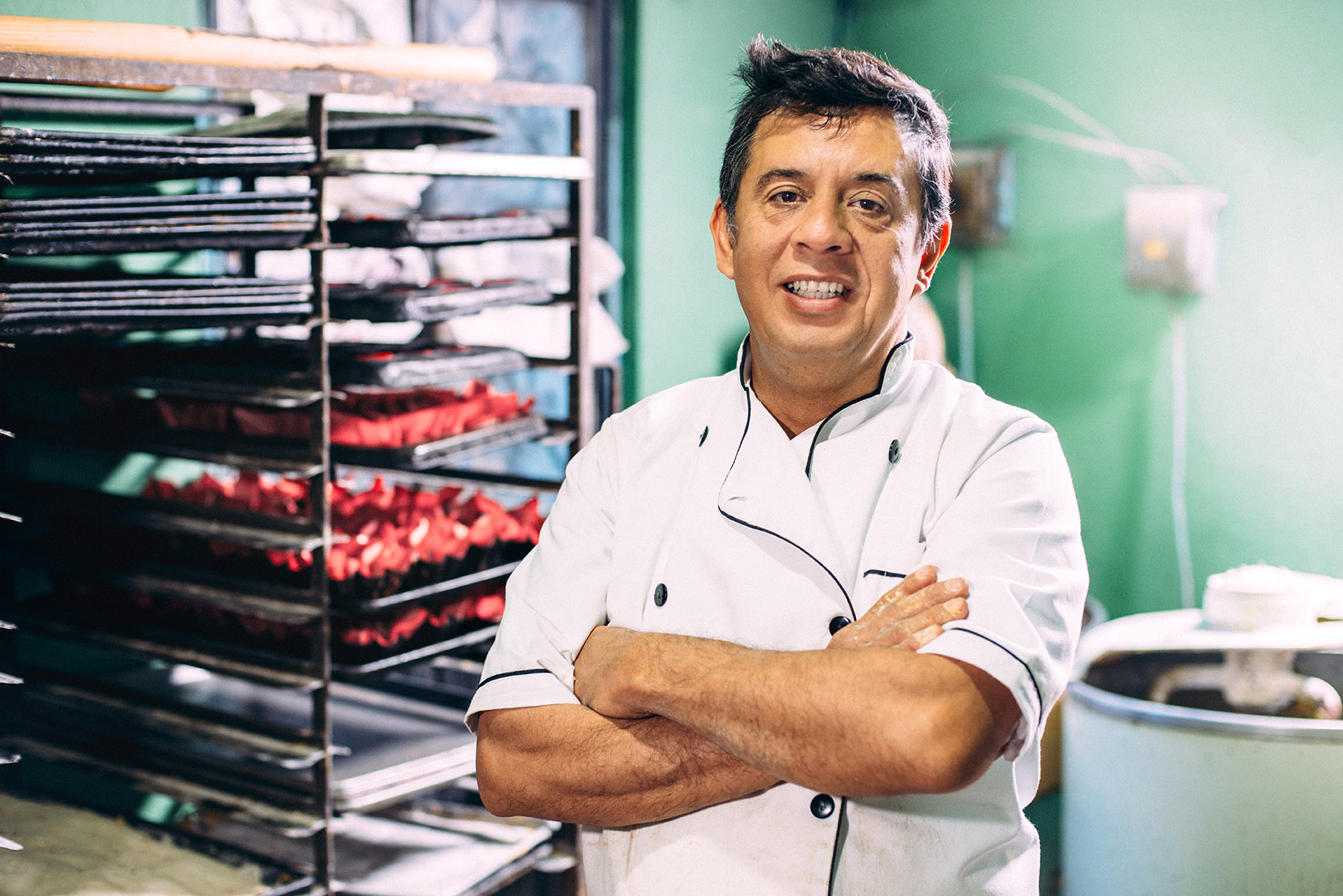 Baker portrait in small Mexican Bakery.