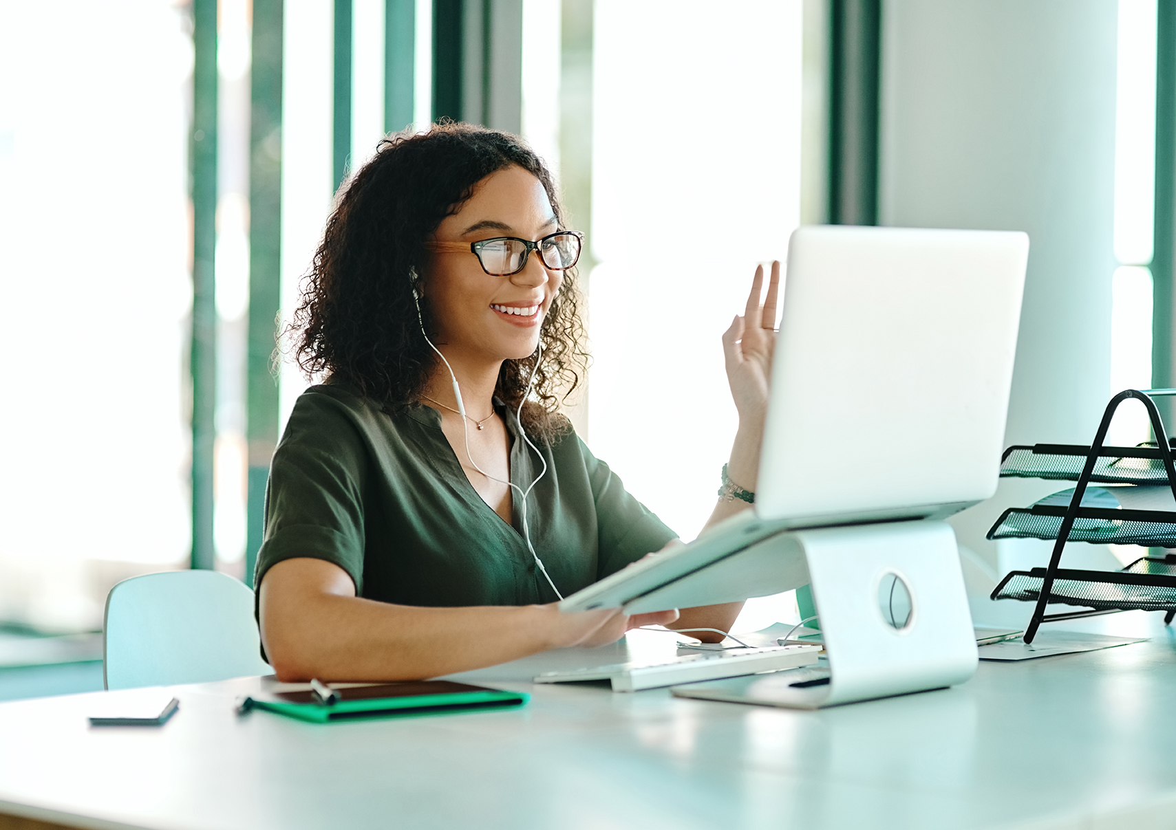 Shot of a businesswoman on a video call while sitting at her desk