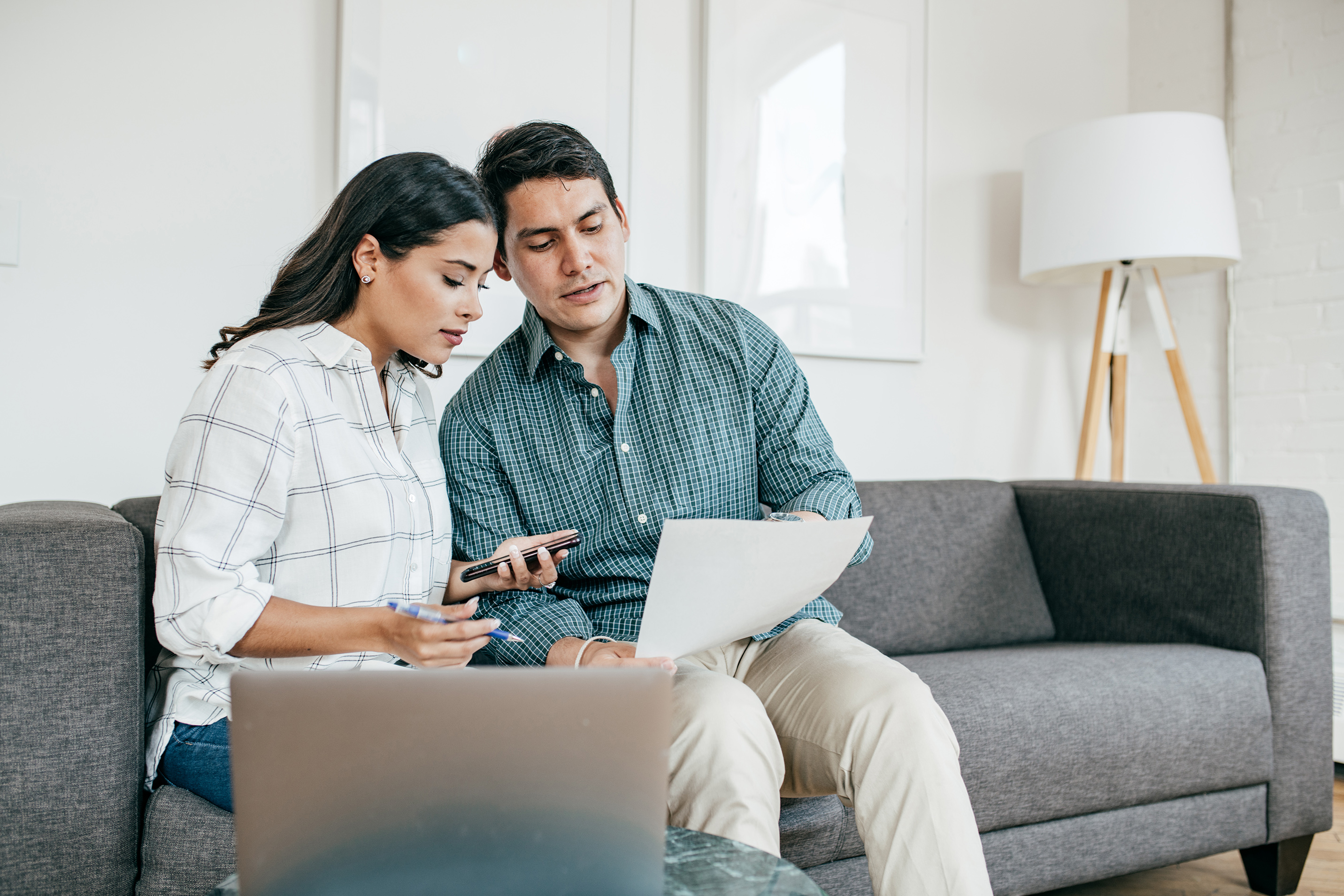 Couple looking on bank statements