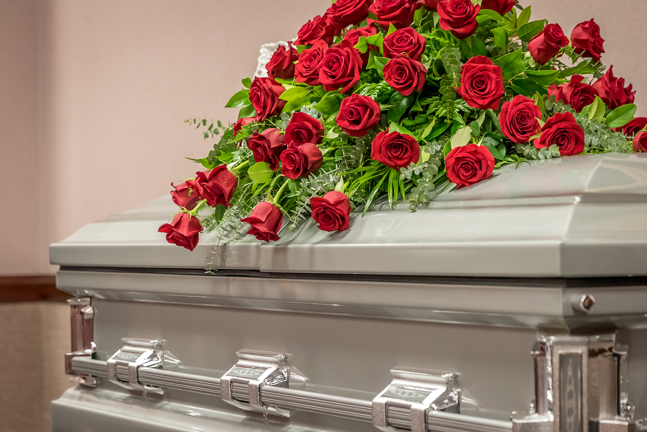 Roses on Top of Funeral Casket