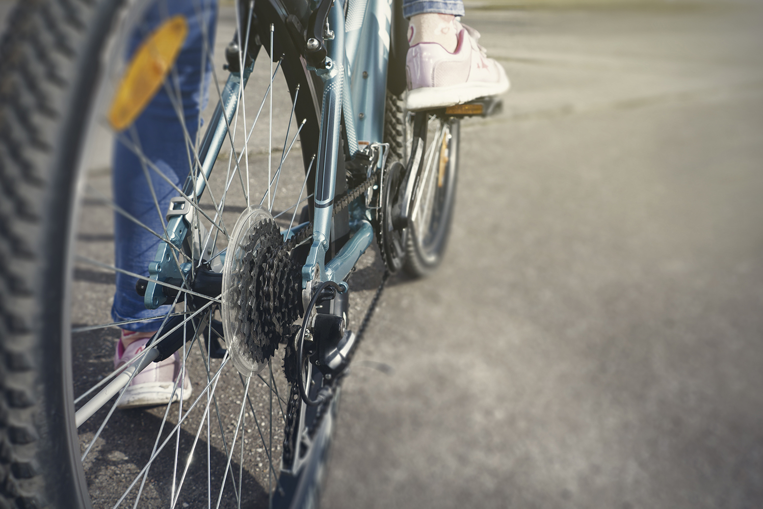 Closeup of a bicycle gears mechanism and chain on the rear wheel of mountain bike