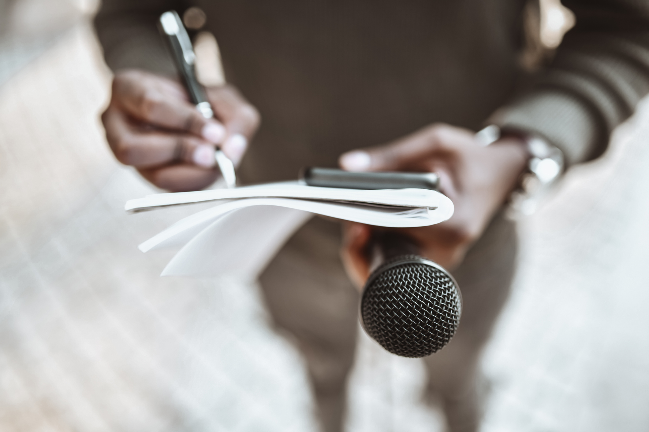 African Male Journalist Preparing Questions For Press Conference