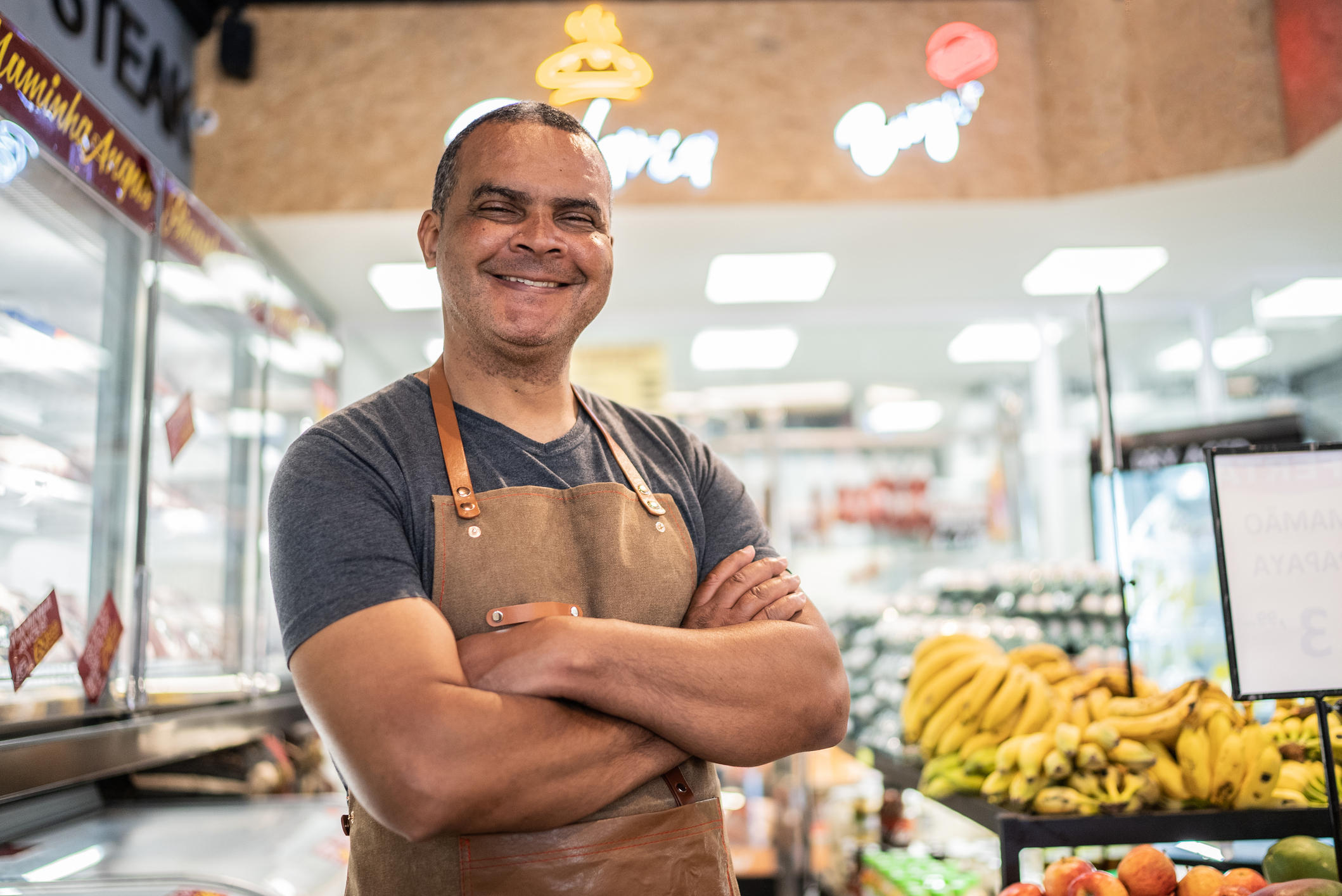 Portrait of a market owner