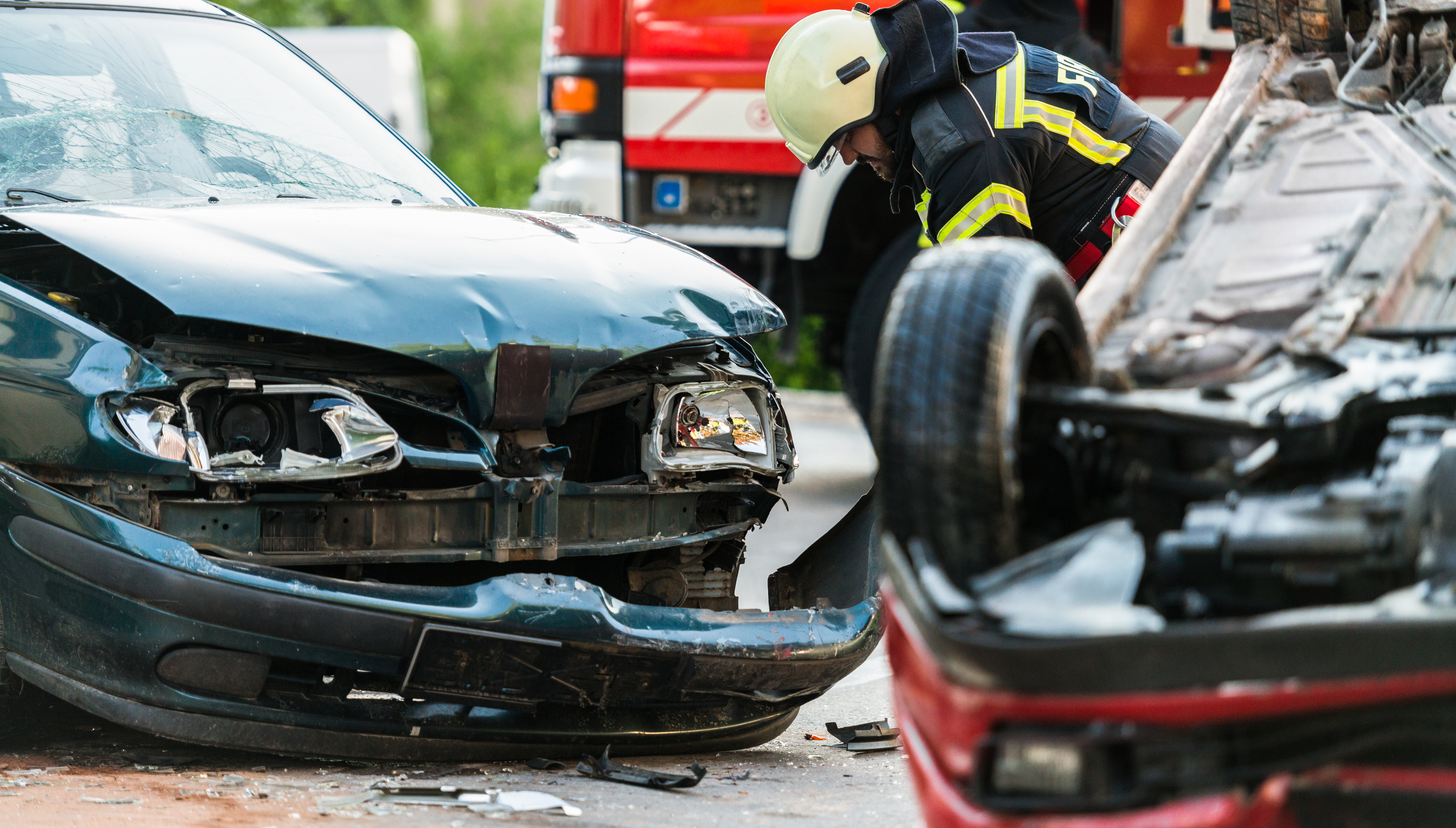 Firefighters At A Car Accident Scene